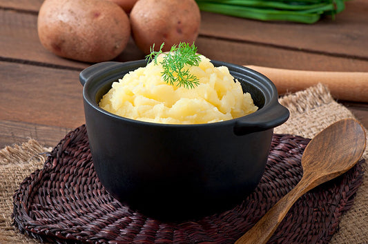 Mashed potatoes served with dill. Cooked potatoes form resistant starch once they cool down.