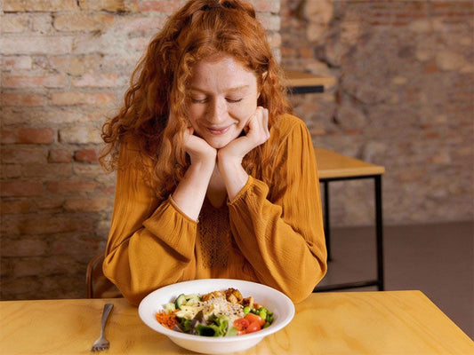 Woman eating a low FODMAP meal